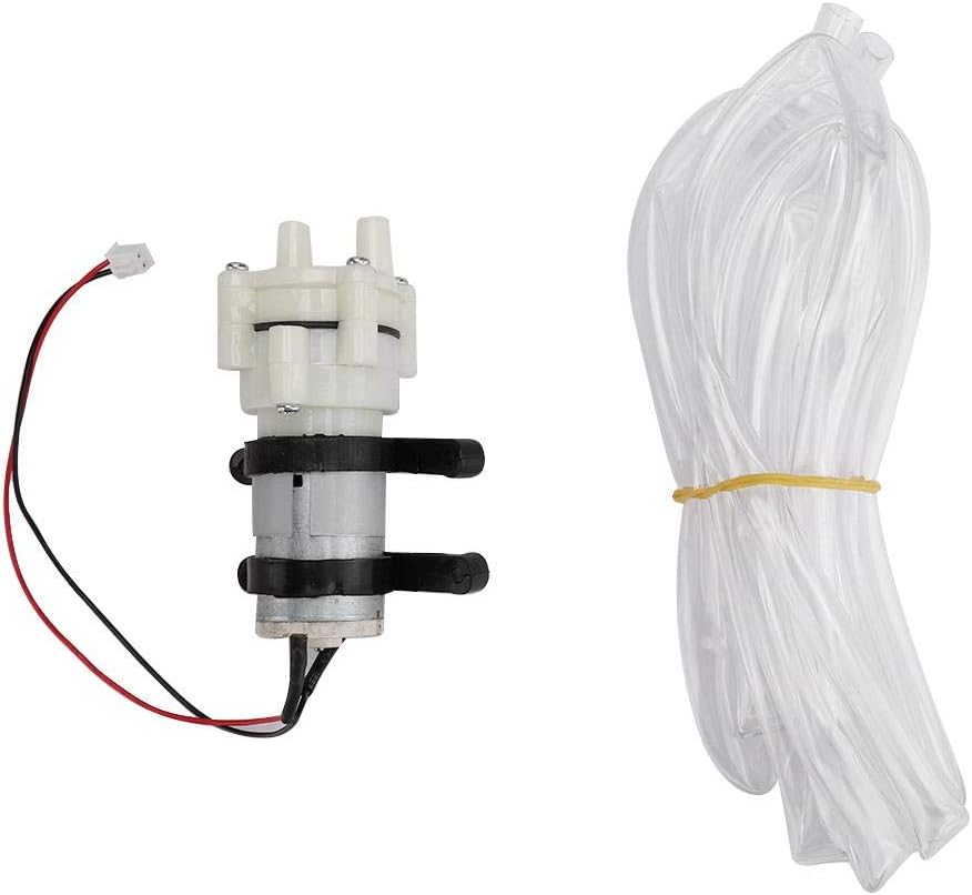 The small water pump and clear water pipe for the cooling system.