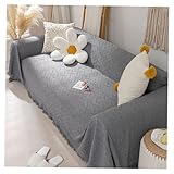 Le style frais et simple fait des serviettes de canapé un magnifique décor dans la décoration de la maison.