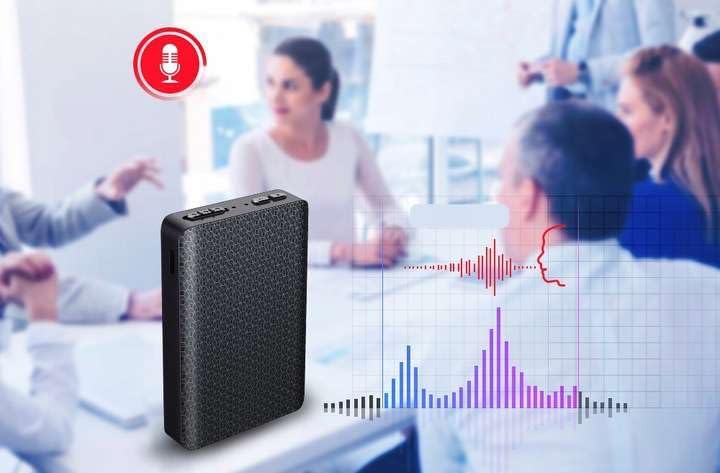 MBG line Q85 Voice Recorder actively recording in a meeting setting, with a sound wave graphic indicating audio capture.