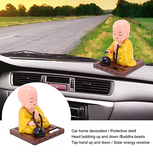 Image of AUGEN Small Buddhist Monk Solar Ornaments, Automatic Nodding Lucky Meaning Light Energy Sensing Eco Friendly Solar Buddhist Monk Statue Decoration for Home Car Dashboard (Pack of 1)(D, Yellow)