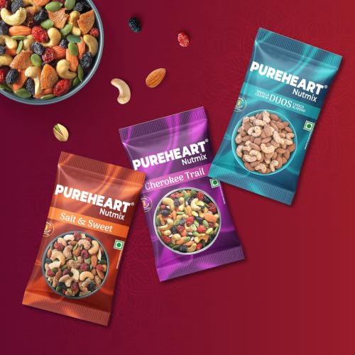 Image of PUREHEART Rakhi Gift Hamper- Vanilla Cashew & Choco Almonds, Cherokee Trail Mix, Sweet & Salt Nutmix (25 g Each) with Chocolate and Floral Rakhi for Brother, Gift Card, Pooja Rice, Kumkum - Crunchy Dry Fruits and Nuts