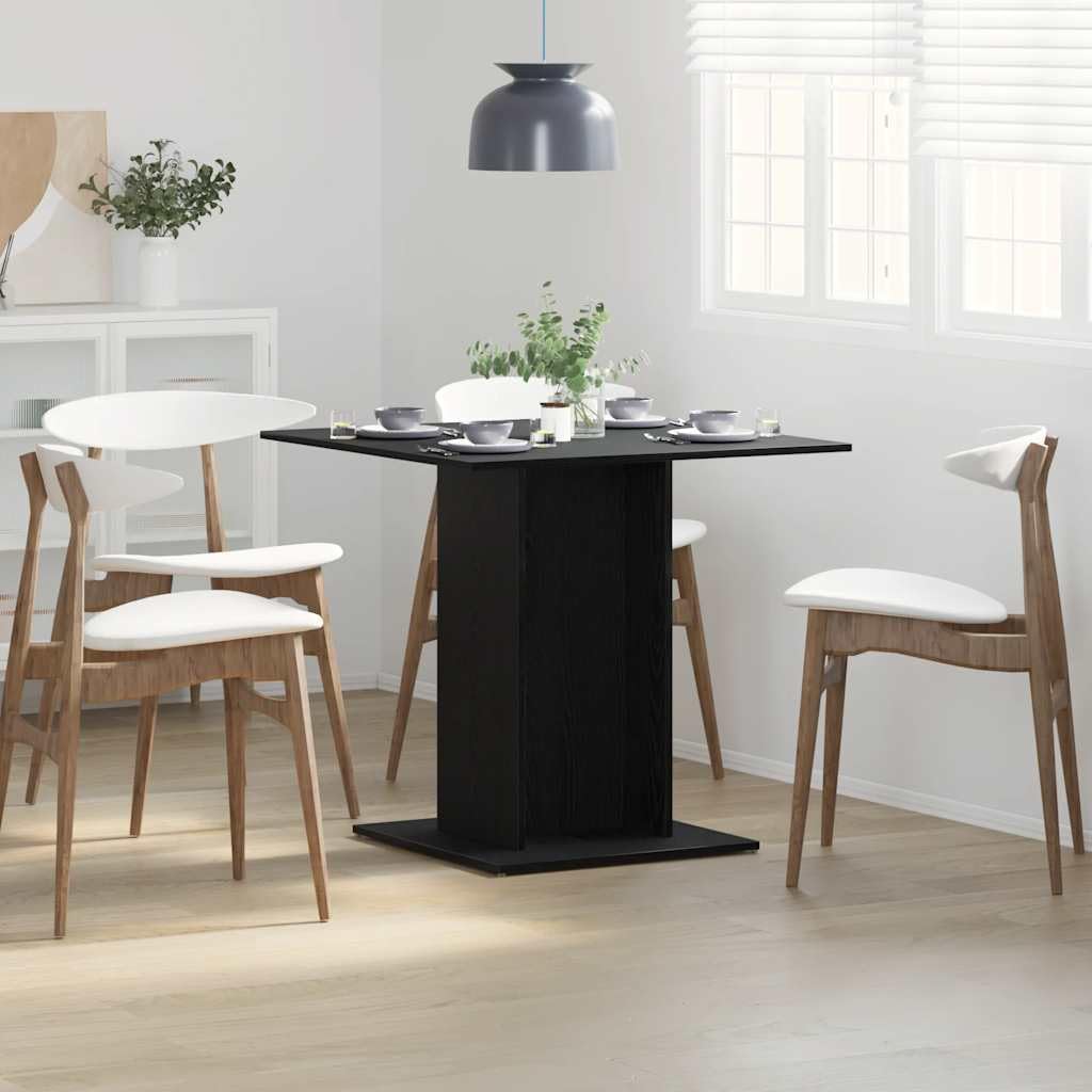 Table de salle à manger compacte en bois noir pour optimiser les petits espaces