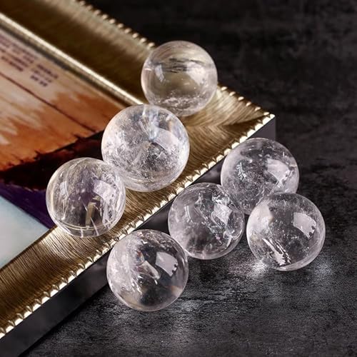 Sphère en cristal de quartz de haute pureté avec support en bois noble