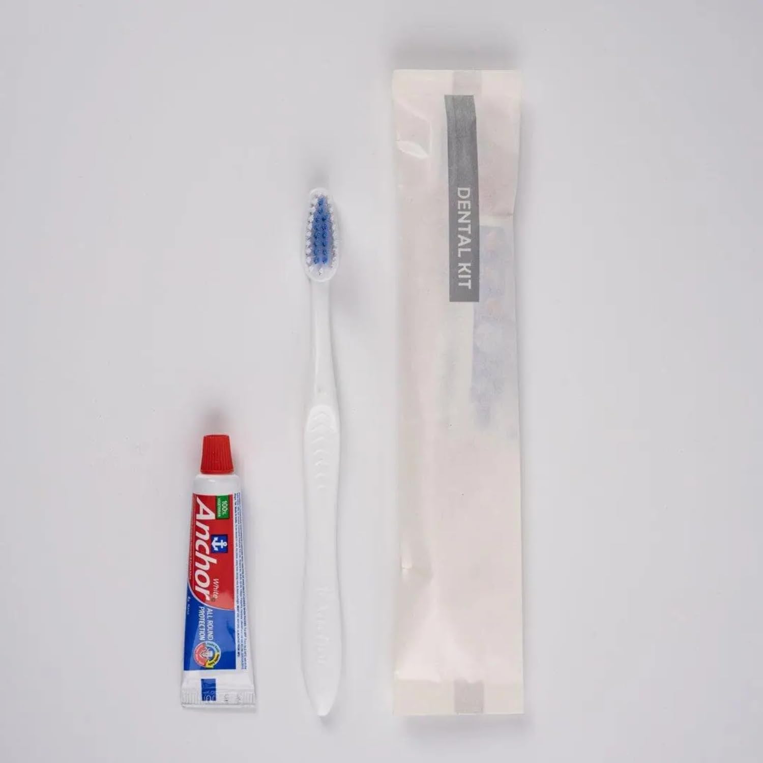 Polism Hotel Dental Kit with Toothbrush and Toothpaste, White Pouch, Pack of 100 - Hotel Toiletries Kit for Guest House, Marriage Hall