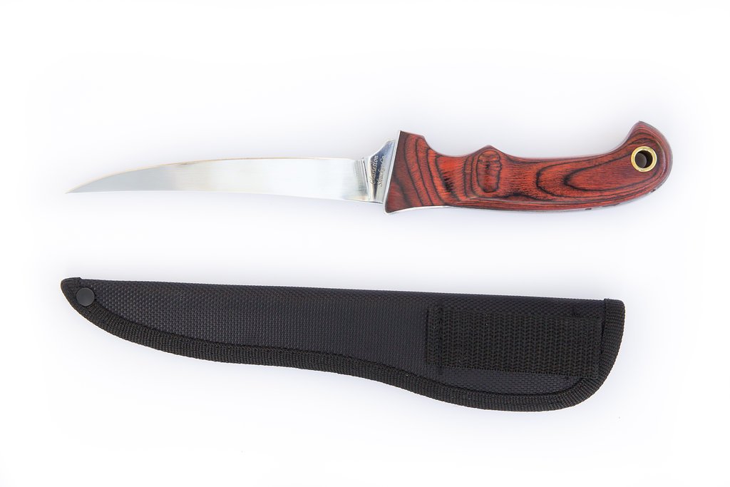 The 5" Carolina Fish Fillet Knife Made of Stainless Steel with Mirror Finish with a Full Tang and Impressive Contoured Dark Wood Handle in a Nylon case
