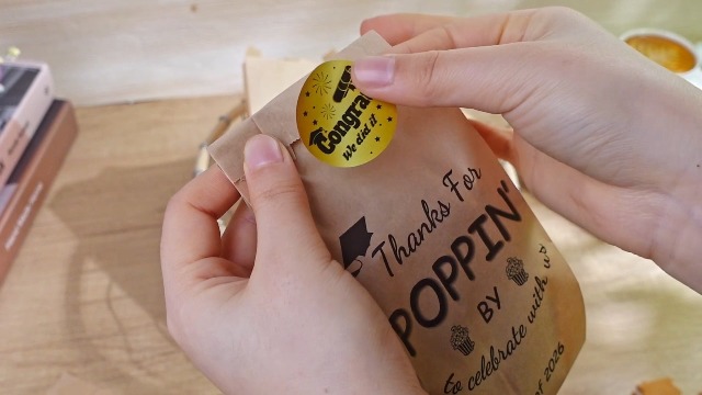 Image of AmazingSpark 50 Pcs Class of 2026 Graduation Popcorn Bags with Stickers Thanks for Popping by Popcorn Bags to Celebrate Smile Style Grease Resistant Paper Individual Servings for Party Favors (Brown)
