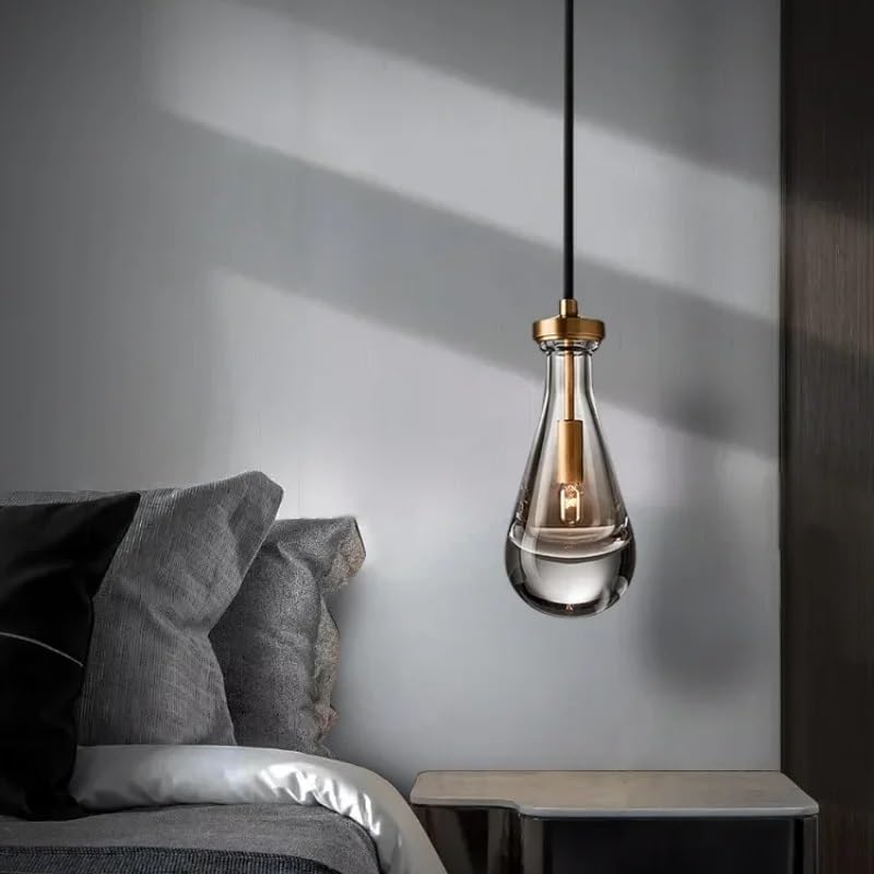 Lampe suspendue en verre moderne : illuminez votre chambre avec style