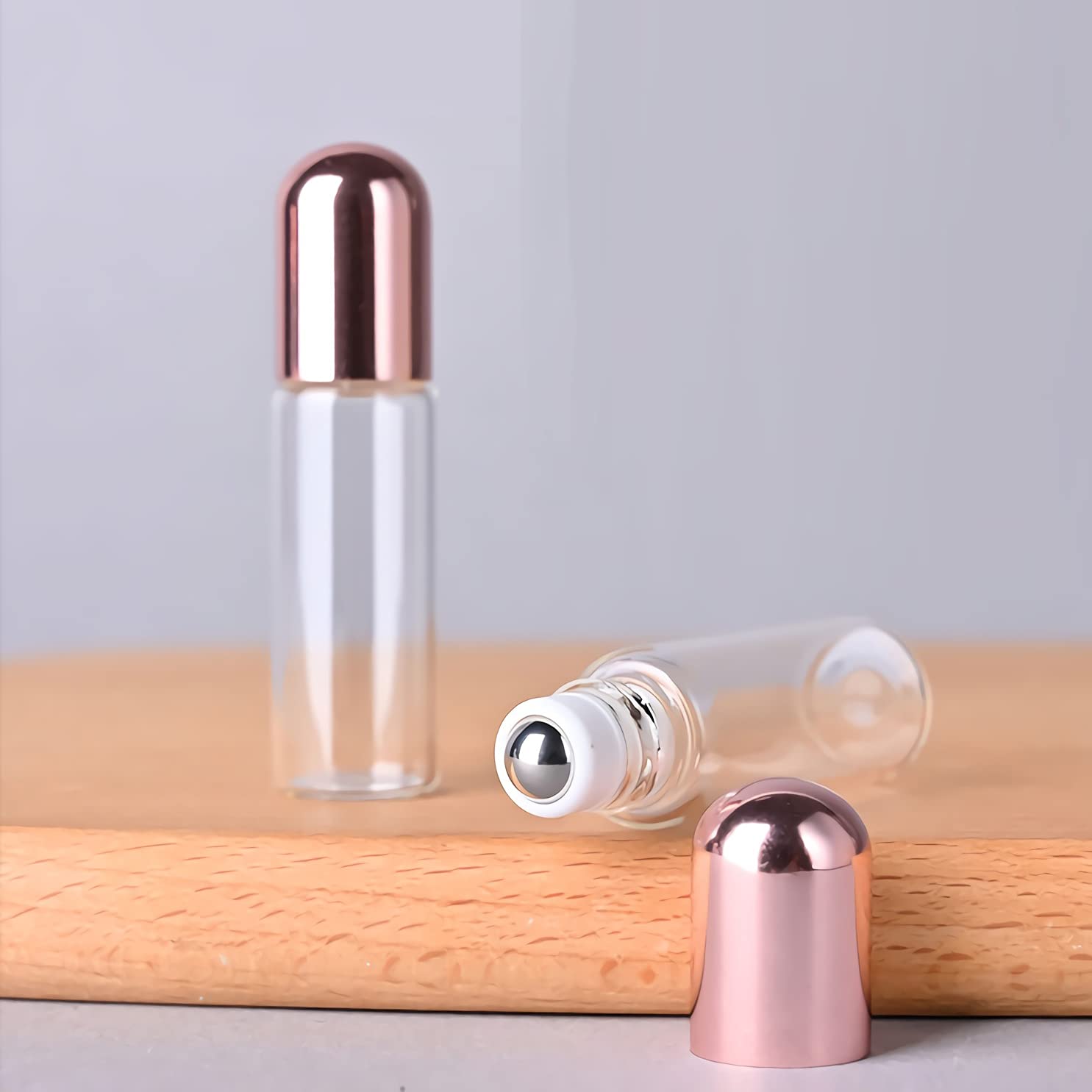 Sprühflasche aus Kunststoff, 50er-Pack, nachfüllbar, 10 ml, transparentes Glas, Roll-on, ätherisches Öl, Roller, leerer Glasprobenbehälter mit rosa Kappe für flüssiges P