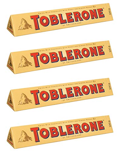 From Switzerland Toblerone Swiss Milk Chocolate With Honey & Almond Nougat Pack of 4 x100g