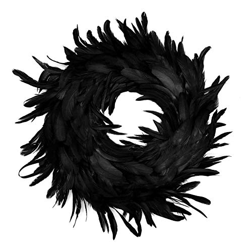 Natural feathers wreath in black for halloween decorations, spook…