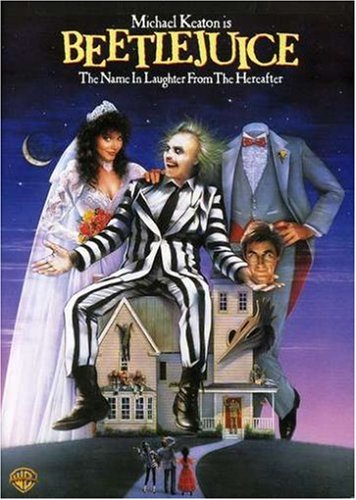 Beetlejuice grinning in his black and white suit