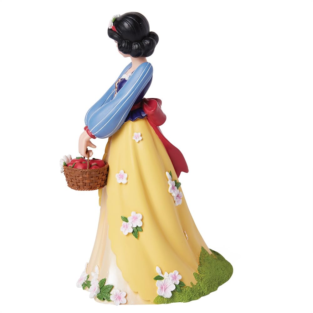 Enesco Disney Showcase Królewna Śnieżka Trzymająca Kosz Jabłko Figurka Botaniczna, 20 cm, Wielokolorowa