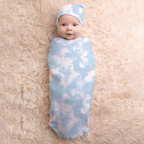 Image of Itzy Ritzy Cocoon and Hat Swaddle Set – Cutie Cocoon Includes Name Announcement Card & Matching Jersey Knit Swaddle and Hat Set, Perfect for Newborn Photos, For Ages 0 to 3 Months (Blue Cloud Tie Dye)