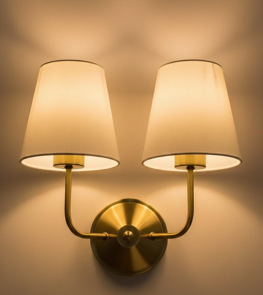 Image of Royal Aura Vintage Gold Wall Lamp | Classic Cream Fabric Pleated Shade | Dual Arm Metal Frame | Decorative Lighting Fixture for Living Room & Bedroom
