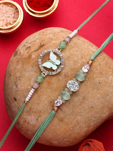 Image of Sukkhi Rakhi Iconic Designer Kundan Meenakari Red Green Gold Plated Premium Rakhi for Brother with Roli Chawal & Greeting Card|Rakhi for Brother /Bhaiya /Bhai /Men|Rakhi Combo-Set of 2
