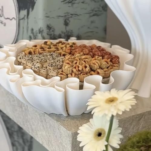 Ripple Serving Tray Elevate your serving experience with the Wavy Serving Plate With its elegant and wavy design this plate brings a touch of art and beauty to any occasion.