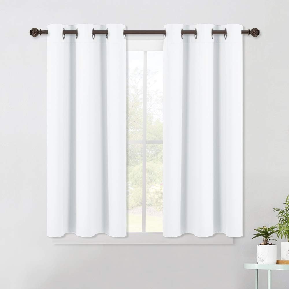 NICETOWN Window Draperies Curtains Panels - Blocking Out 50% Sunlight Curtains, Grommet Top Small Window Drapes for Bedroom (2 Panels, 42 by 45, White) - Amazon product rated Grade A