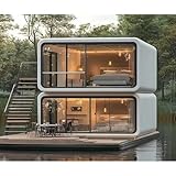 casas prefabricadas modernas Diseño futurista de doble capa: eleva tu estilo de vida con nuestra icónica cabina Apple de dos pisos. La estética curvada única y la silueta futurista hacen que sea una adición destacada a cualquier propiedad. Con un balcón de nivel superior y amplias ventanas de piso a techo, ofrece vistas panorámicas de 360° incomparables y luz natural.
