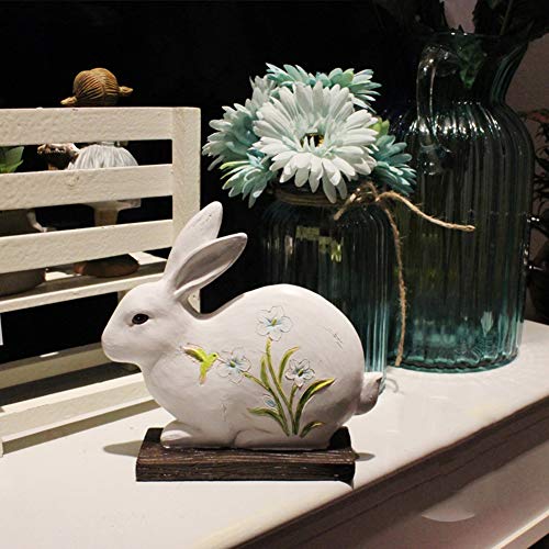Statue de lapin extérieur horizontal pour embellir un parterre fleuri