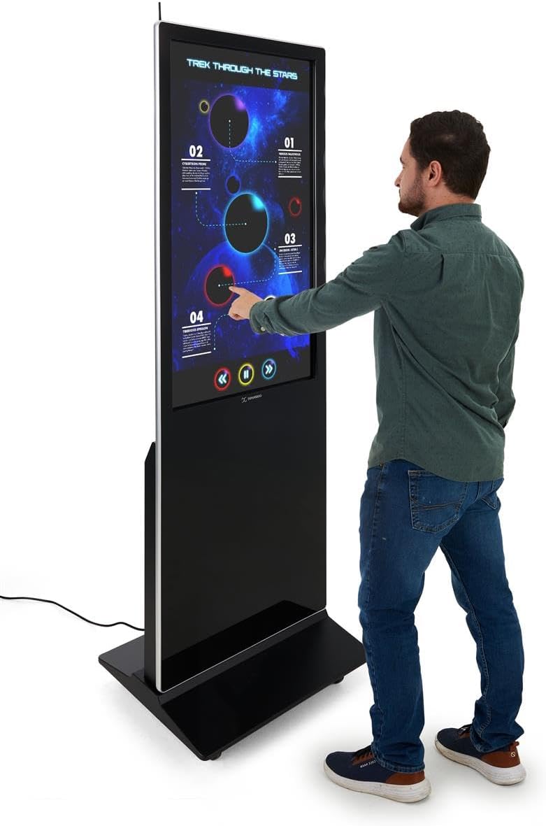 User interacting with the multi-touch screen of the kiosk