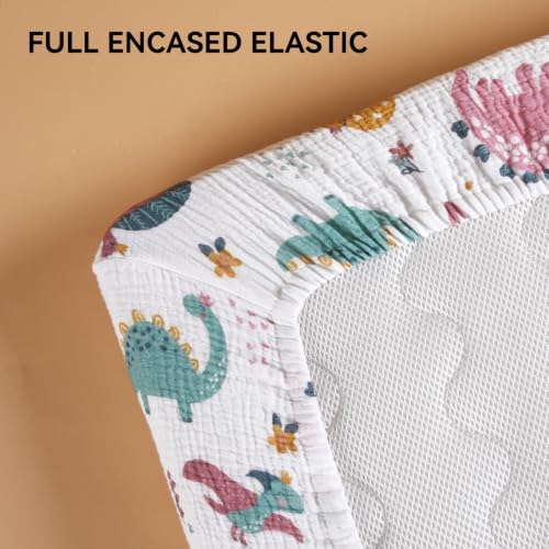Image of TILLYOU 2 Pack Muslin Crib Sheets for Boys and Girls, 100% Cotton Fitted Crib Sheet for Toddler 52x28 Standard Crib Mattress, Dinosaur Rainbow