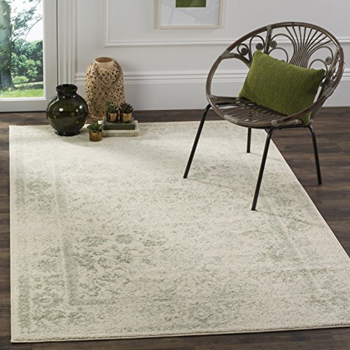 Image of SAFAVIEH Adirondack Collection Area Rug - 5'1" x 7'6", Ivory & Sage, Distressed Vintage Floral Design, Non-Shedding & Easy to Clean, Ideal for Living Room, Bedroom, Dining Space (ADR109V)