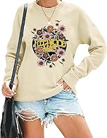 ★★Material: This womens vintage rock music shirt is made of Cotton Blend, super soft and comfortable to wear. ★★Features: Retro rock roll sweatshirt, novelty flowers graphic tshirt for women, funny letter print long sleeve sweatshirt, casual loose fi...