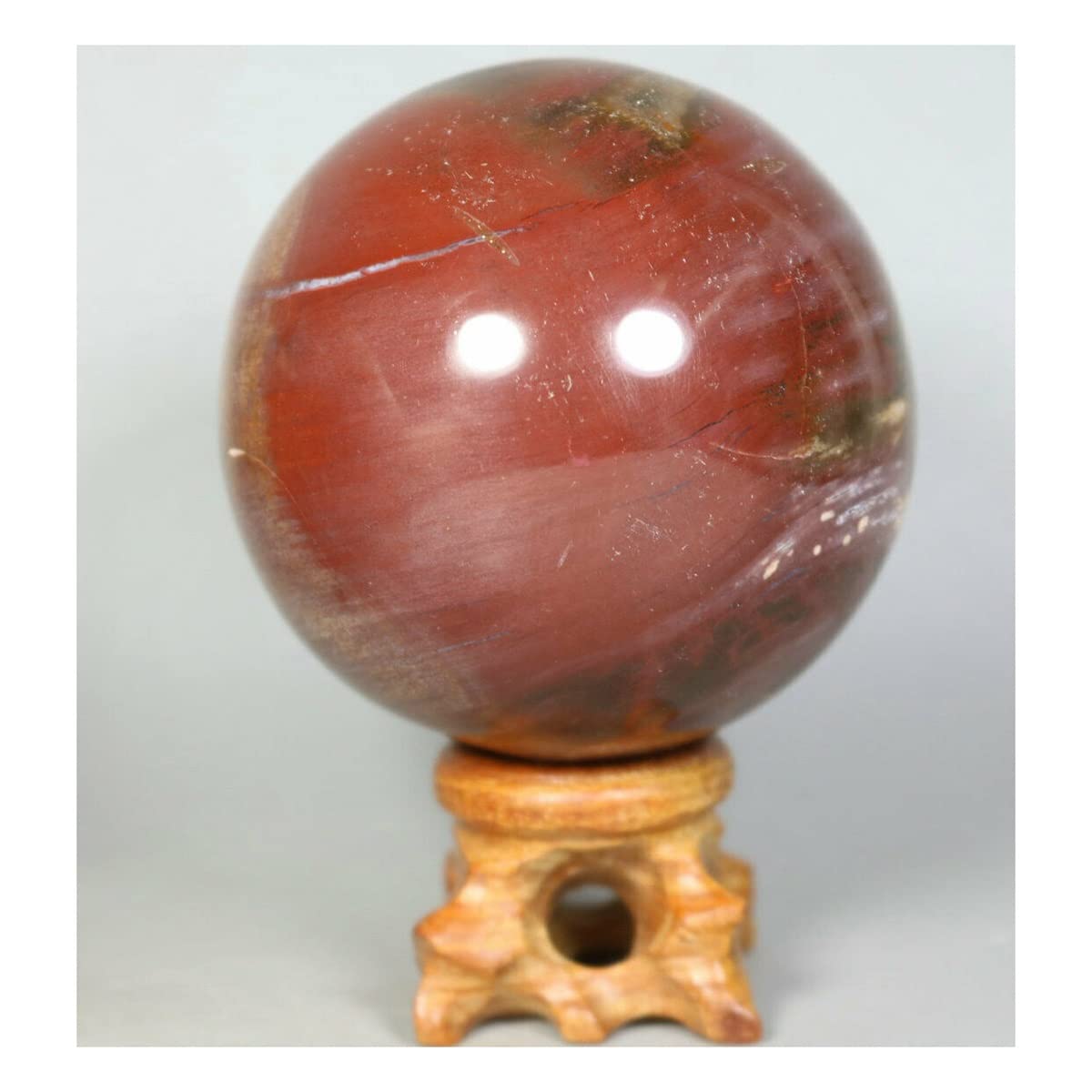 Bola de cristal de madera petrificada pulida de 50-55mm para decoracion