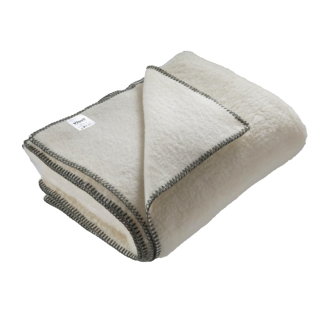 Couverture en laine anti froid Woolf plaid chaud pour isoler votre lit