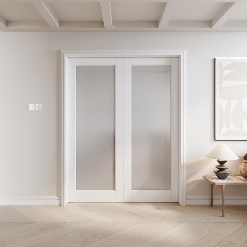 Alli-Inclusive Sliding Pocket Doors in a fully closed position, showcasing the frosted glass panels.