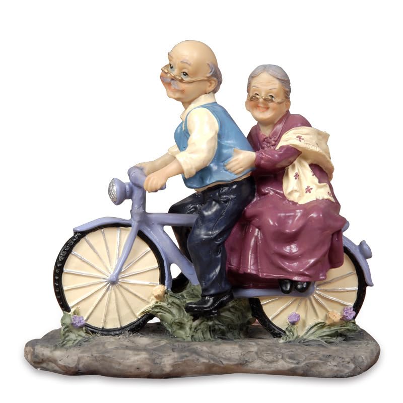 Sculpture de couple de mariage doré, le symbole d'un amour éternel pour vos parents