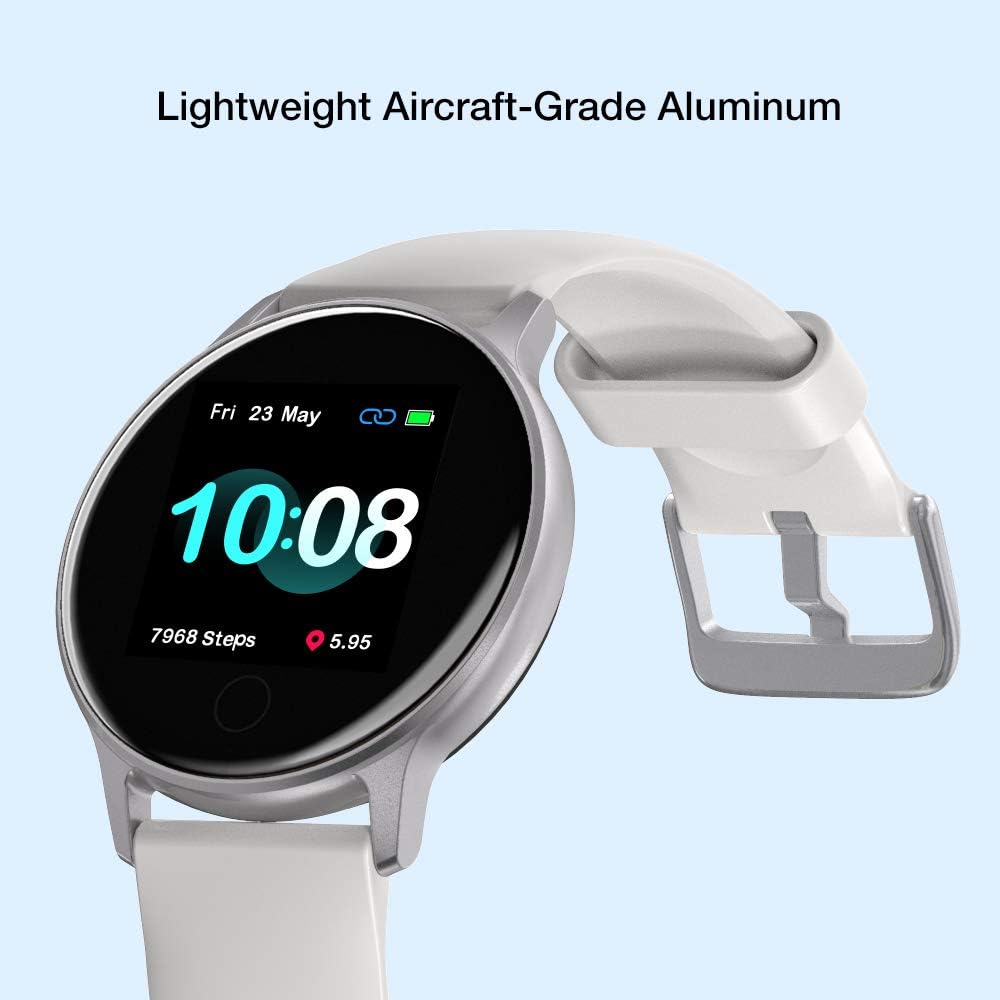 UMIDIGI Uwatch 2S Smart Watch on a blue and white target background, displaying a battery charging icon, with the magnetic charging cable connected.