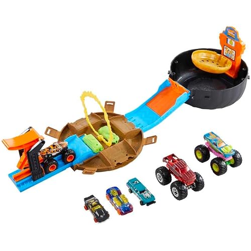 Hot Wheels Toy Monster Trucks Playset, Tire-Shaped Case Transforms into Race Course, 3 Trucks & 4 Cars in 1:64 Scale, Stunt Tire (Amazon Exclusive)