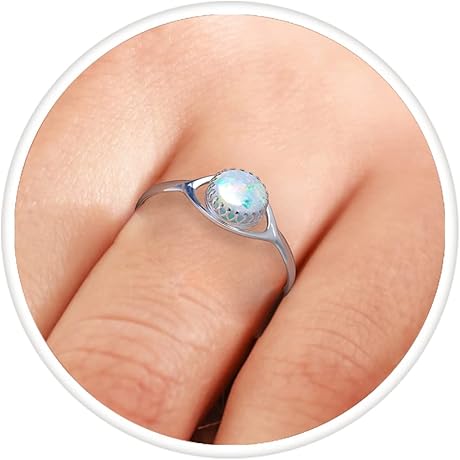 Elegant and Ethereal: White Opal Crown Ring