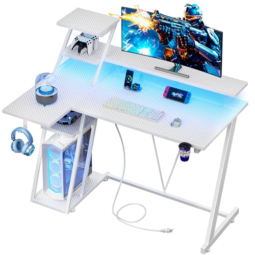 Image of Korfile 40 Inch White Gaming Desk with LED Lights & Power Outlet, Small Gaming Computer Desk with Storage Shelves, L Shaped Gamer Workstations with Monitor Stand for Bedroom