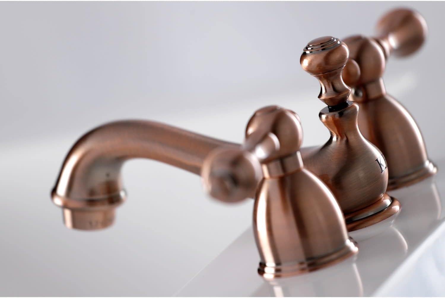 Kingston Brass KS3952AL Restoration Mini Widespread Lavatory Faucet with Metal lever handle, Polished Brass, 4-Inch Adjustable Center