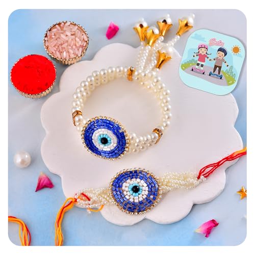 Image of CraftVatika Designer Rakhi Set for Brother and Bhabhi, Premium Evil Eye Rakhi for Bhaiya Bhabhi Set of 2, Evil Eye Rakhi Bracelet Lumba for Bhabhi With Fridge Magnet Gift for Men Women, Greeting Card, Tilak Set, Magnet for Home Decor