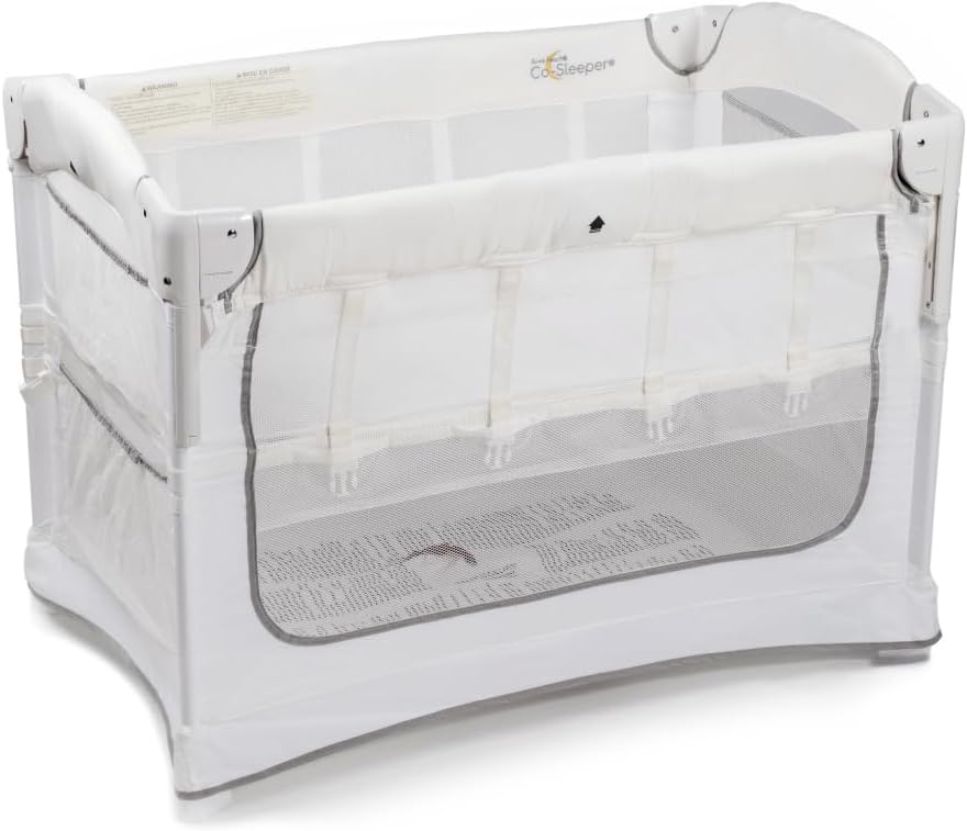 Arm’s Reach Ideal Ezee 3 in 1 Co-Sleeper Folding Bedside Bassinet and Play Yard Featuring Breathable Mesh Sides with Side Pockets for Storage and 4-Inch Sleeping Nest, White
