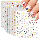 Dolce design a cartone animato: Gli adesivi per unghie con animali, frutti, fiocchi e stelle portano immediatamente buonumore. Motivi carini come coniglietti, orsi e ciliegie rendono ogni look giocoso e ideale per le ragazze