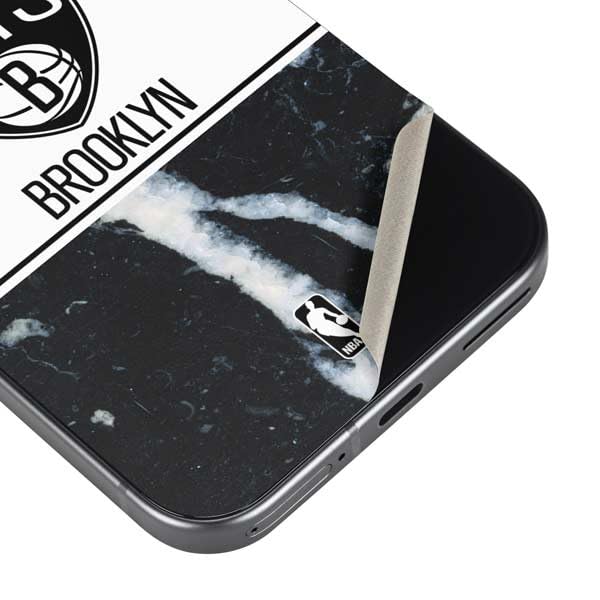 Skinit Decal Phone Skin Compatible with Google Pixel 9a - Officially Licensed NBA Brooklyn Nets Marble Design