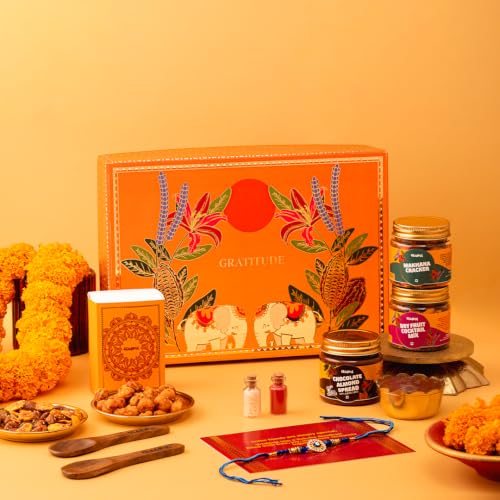 Image of Gladful Premium 7 Items Rakhi Gift Box for Brother | Orange Elephant Hamper with Gourmet Snacks, Chocolate Spread, Rakhi & Greeting Card | Luxurious Raksha Bandhan Gift