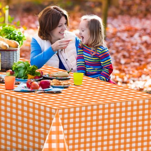 Image of 12 Pack Orange Plastic Checkered Tablecloth, Premium Decorative Disposable Orange Gingham Plaid Table Cloths for Parties, Rectangle Party Table Cover for Fall Thanksgiving Picnic Birthday, 54x108 Inch