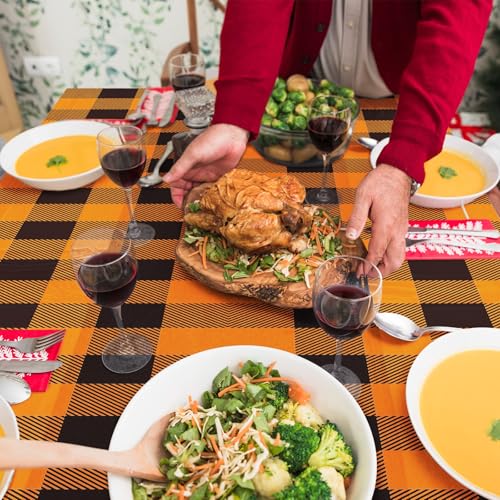 Image of Gistome 3-Piece 54 x 108 Inch Orange and Black Checkered Plastic Tablecloth - Disposable Rectangle Table Cover for Dining, Birthday, Halloween, Thanksgiving, Autumn Fall Themed Decorations