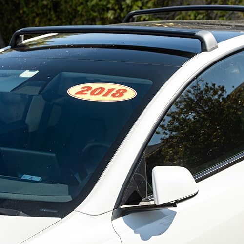 Image of 2018 Car Model Year Windshield Stickers | 14 inch x 5.5 inch Oval Stickers for Car Dealerships, Vehicle Windshields (Pack of 12)