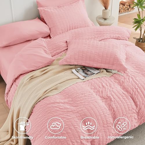 Image of HYMOKEGE Rose Pink King Size Comforter Set Seersucker 7 Pieces, All Season Luxury Bed in a Bag for Bedroom, Bedding Set with Comforter, Sheets, Pillowcases & Shams