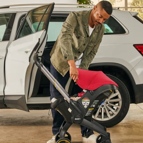 Image of Doona Baby Car Seat & Travel Stroller Flame Red - Convertible 0+ Car Seat and Pram with 5 Point Safety Harness - Ergonomic Pushchair and Travel System - ISOFIX Base Sold Separately