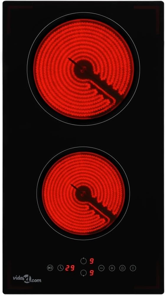 Ceramic hob with glowing red heating elements and digital display showing heat level 9 for both burners.