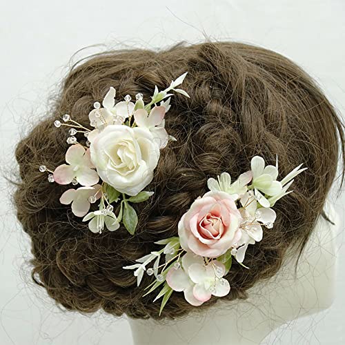 Coiffure de mariage romantique avec peigne à cheveux fleurs rose