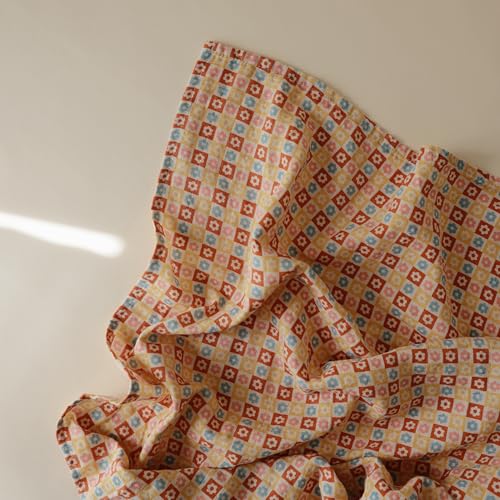 Image of mushie Muslin Baby Swaddle Blanket | 100% Organic Cotton (Happy Flowers Check)