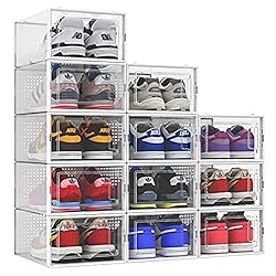 3 stacks of white and clear shoe storage boxes filled with sneakers.